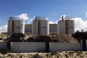 Storage tanks stand at the oil refinery at Zueitina near the northeastern Libyan town of Ajdabiyah