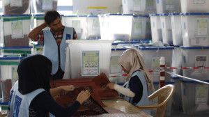 Employees of the IHEC take part in vote counting at an analysis centre in Arbil, capital of the autonomous Kurdistan region