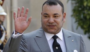Morocco's King Mohammed VI waves after talks at the Elysee Palace in Paris
